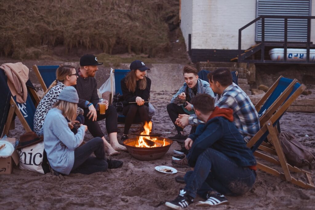 friends around campfire