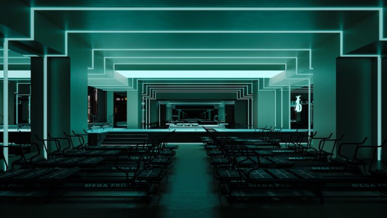 Interior of REFORMD's dark-lit Lagree studio