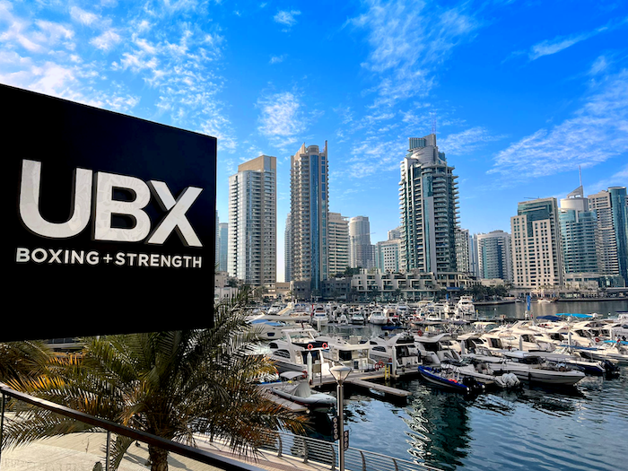 UBX sign with Brisbane's skyline in the background