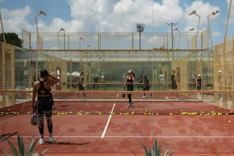 Group of people playing padel outdoors