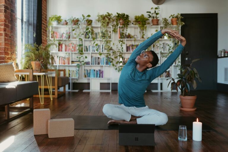 A man doing yoga in a living room