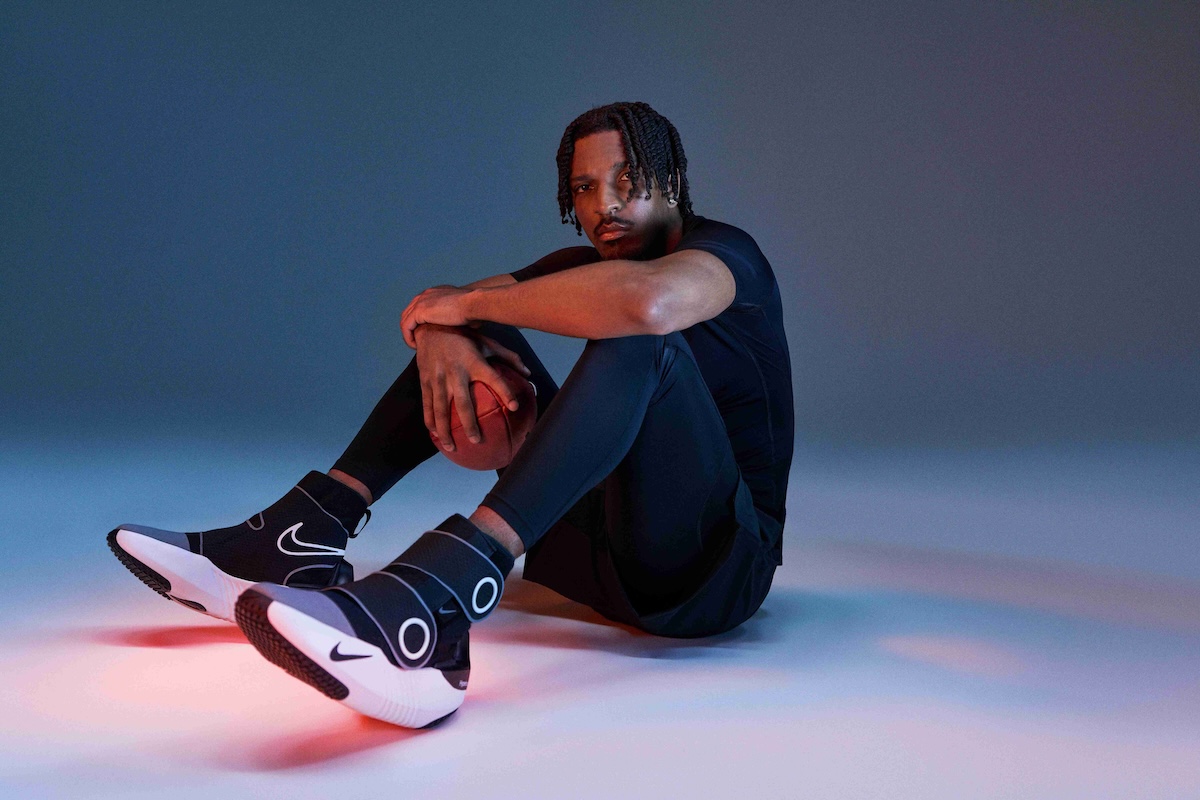 Jayden Daniels posing in street clothes, wearing the Hyperboot