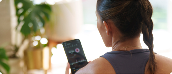 A woman looking at her phone