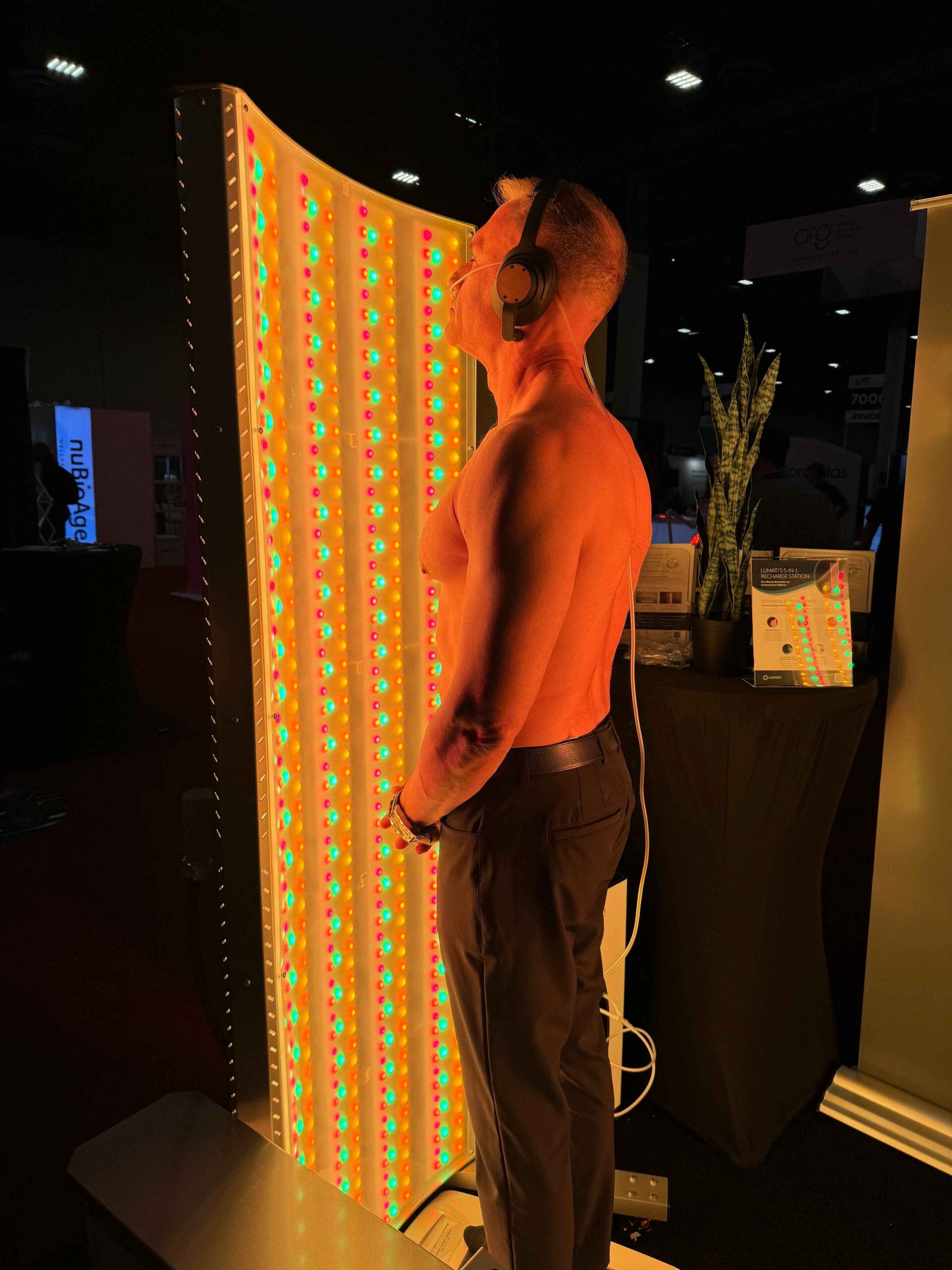 Gary Brecka standing in front of Lumati light therapy