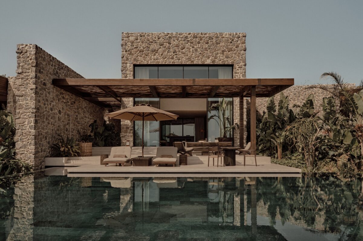 Exterior of Scorpio Bodrum resort, featuring luxury pool and lounge area