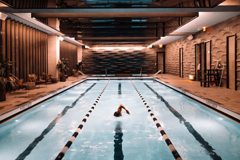 A person swimming in a pool