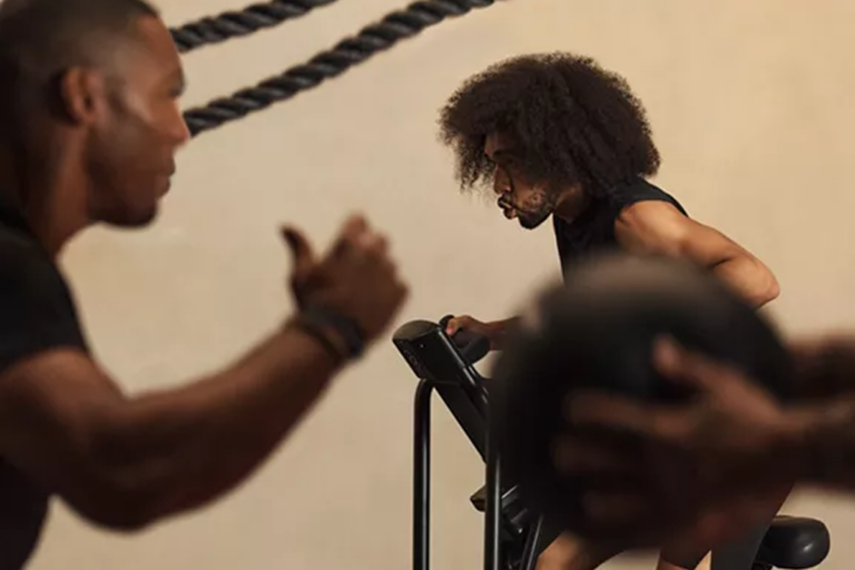 Two men performing functional workouts