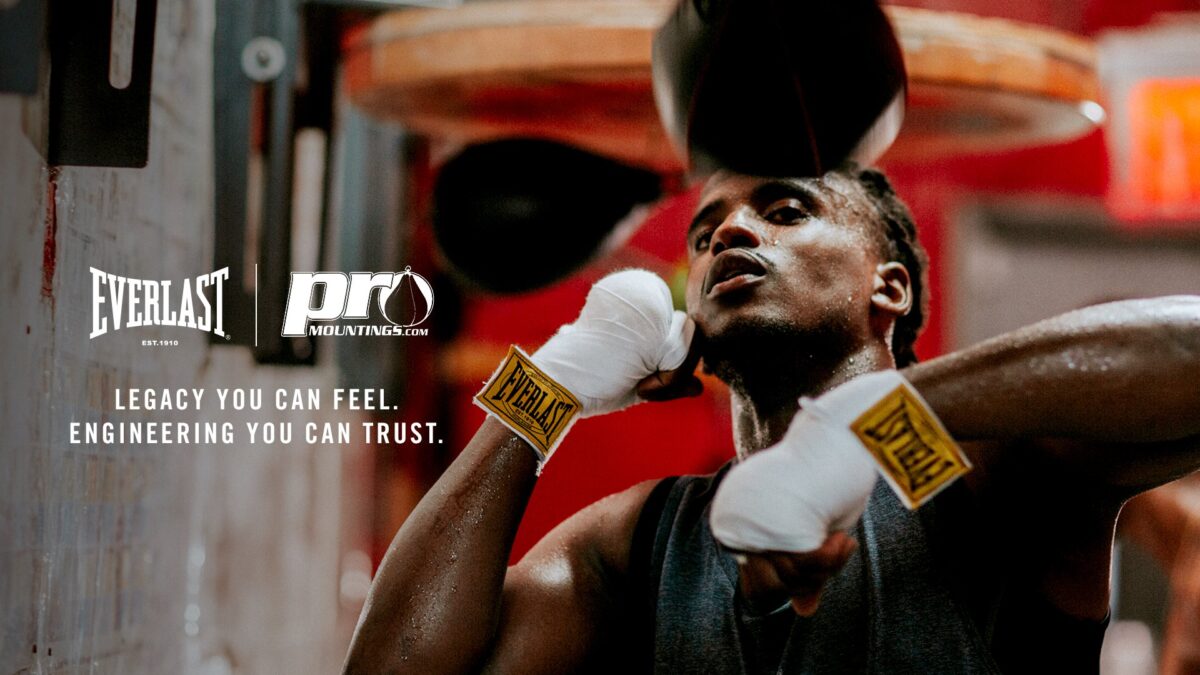 Female boxer with Everlast and Pro Mountings logo