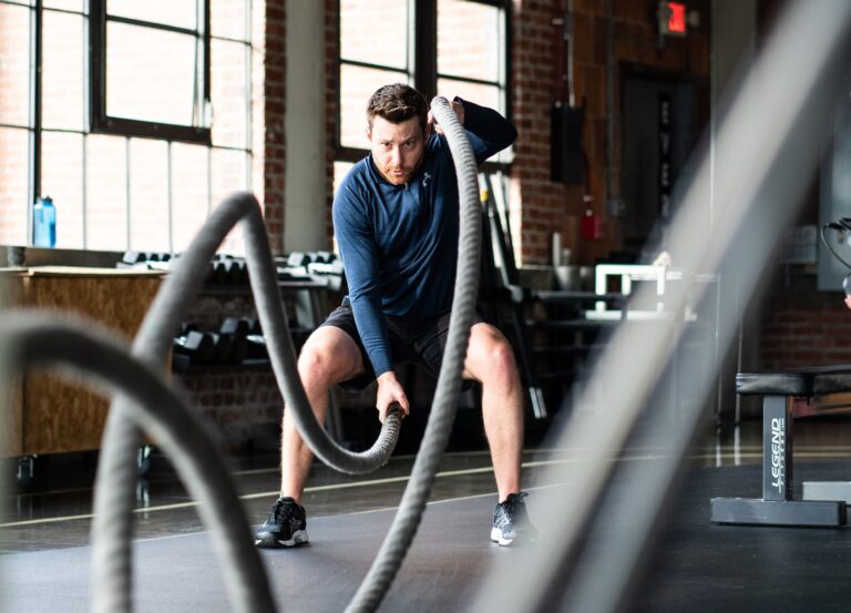 A man using exercise ropes