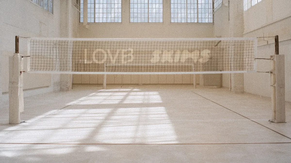 Volleyball net with LOVB and SKIMs logos on it