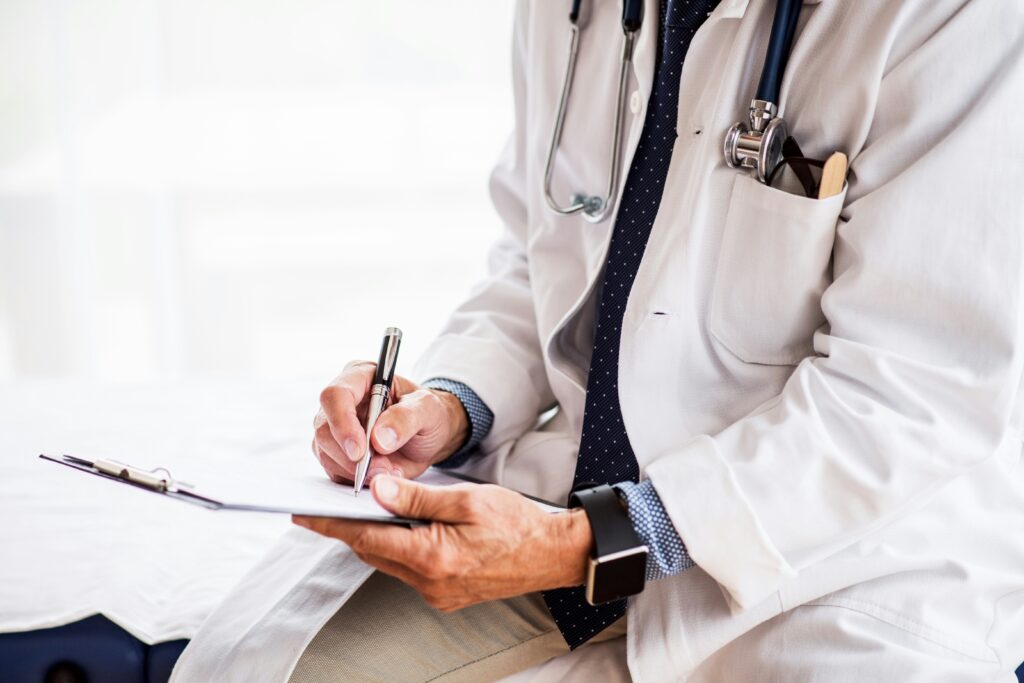 A doctor writing a prescription