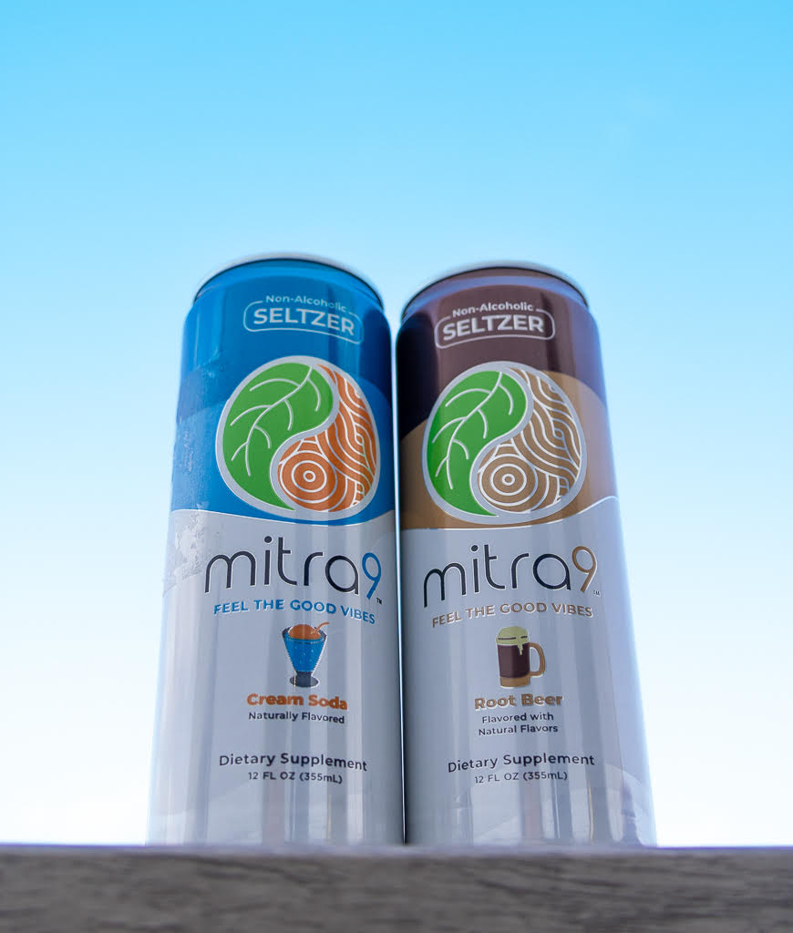 Two Mitra9 canned beverages