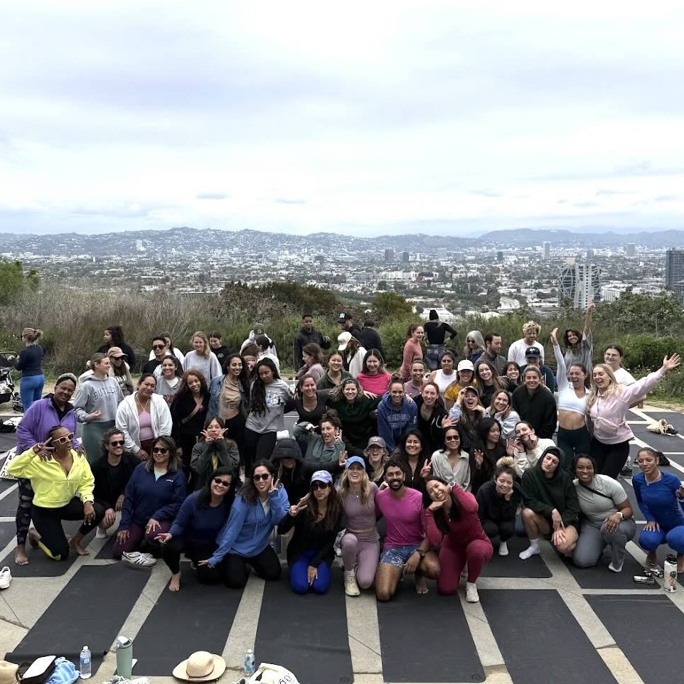 Group of yoga participants outdoors