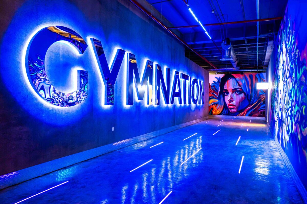 Blue-lit GymNation hallway
