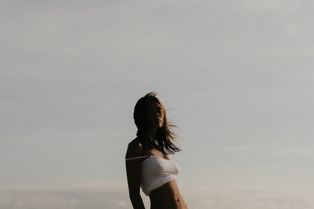 A woman's silhouette in a natural setting