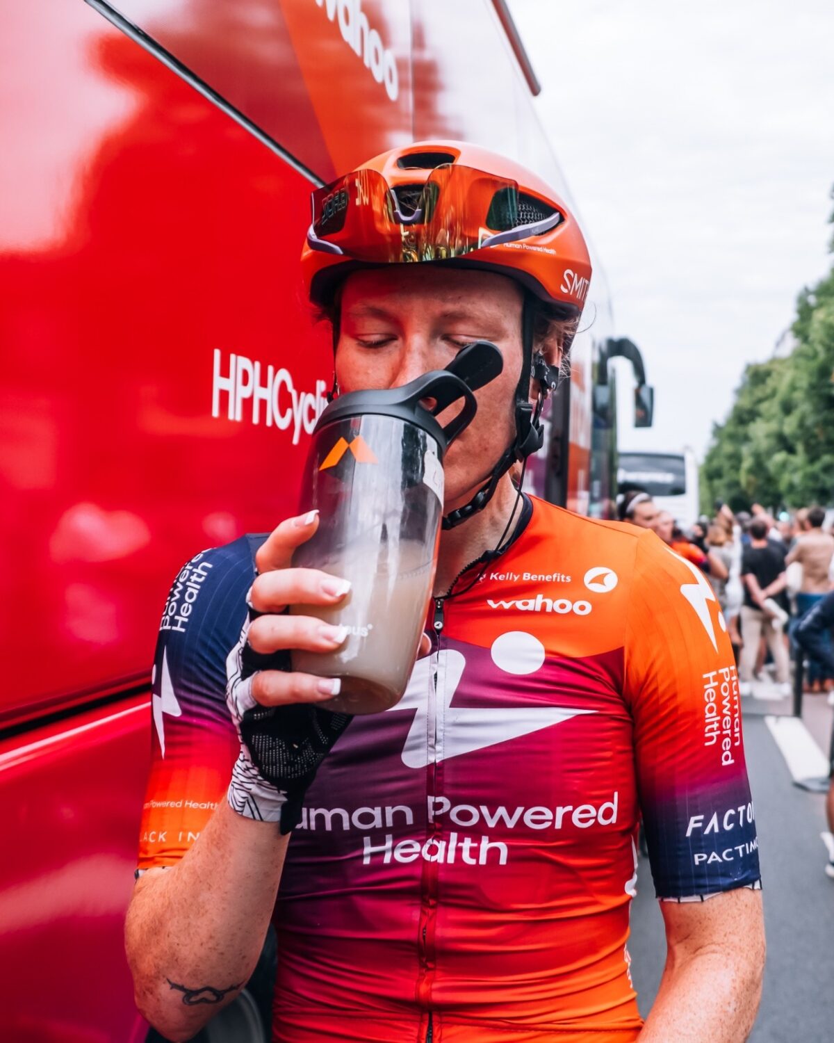 Cyclist drinking a nutrition drink