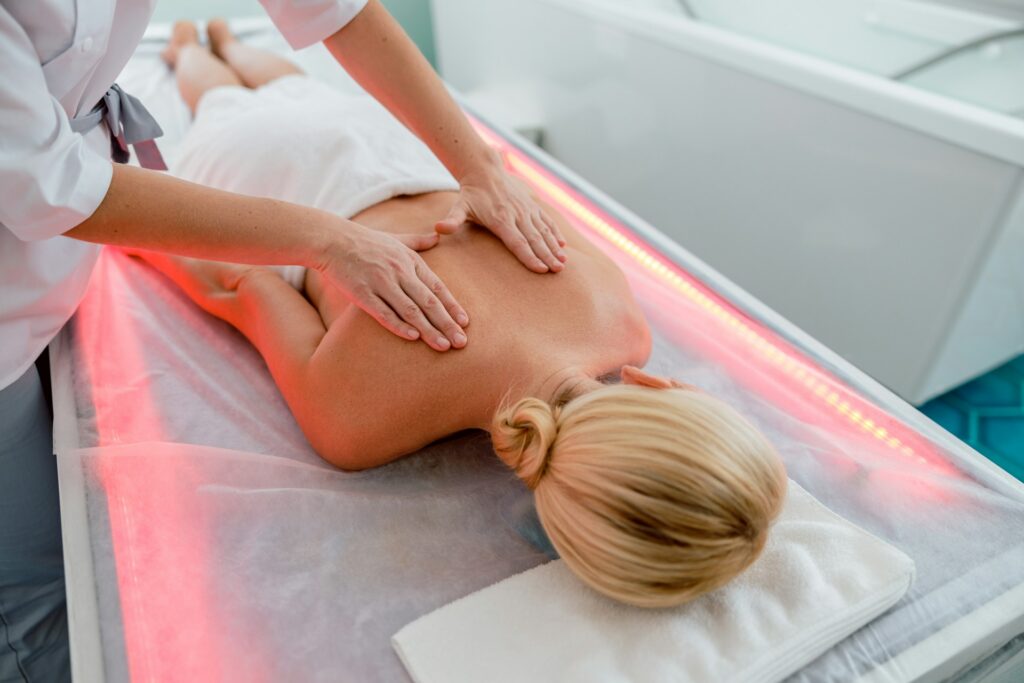 Woman receiving a red light massage