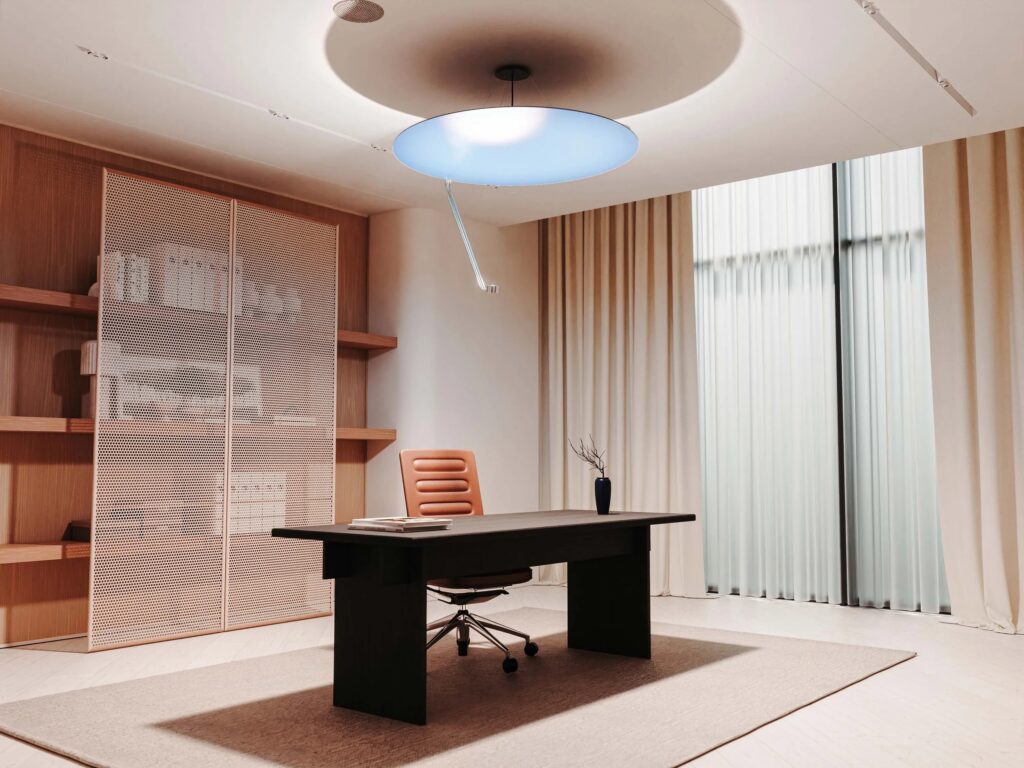 Home office with Sunday Lighting light therapy fixture