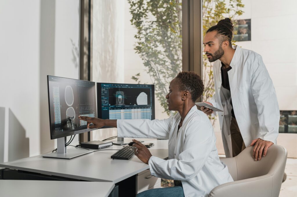 Doctors assessing scans