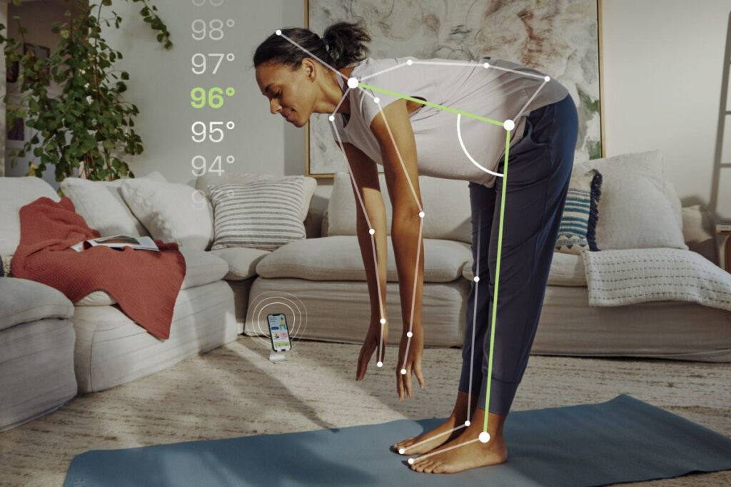 Woman reaching towards her toes