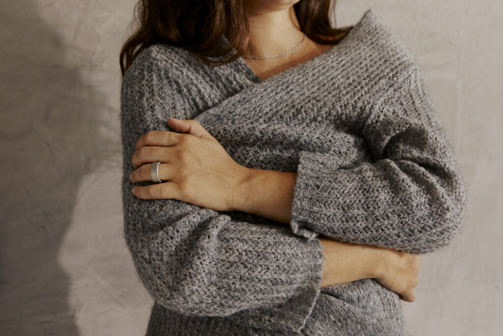 Woman wearing an Oura ring