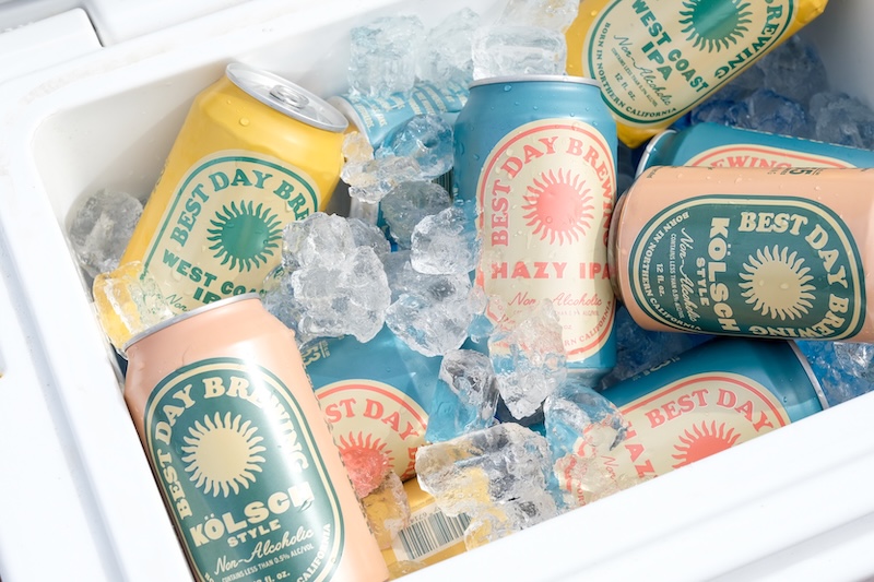 Cans of Best Day Brewing in a cooler