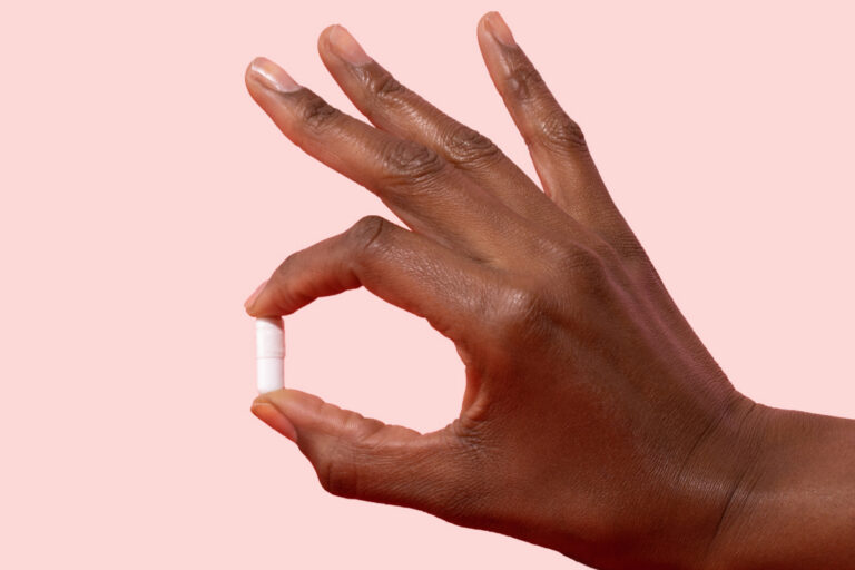 Woman holding Naltrexone