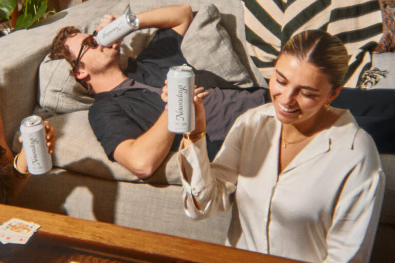 Two people relaxing while drinking Nowadays THC drinks