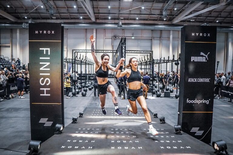 HYROX pair crossing the finish line