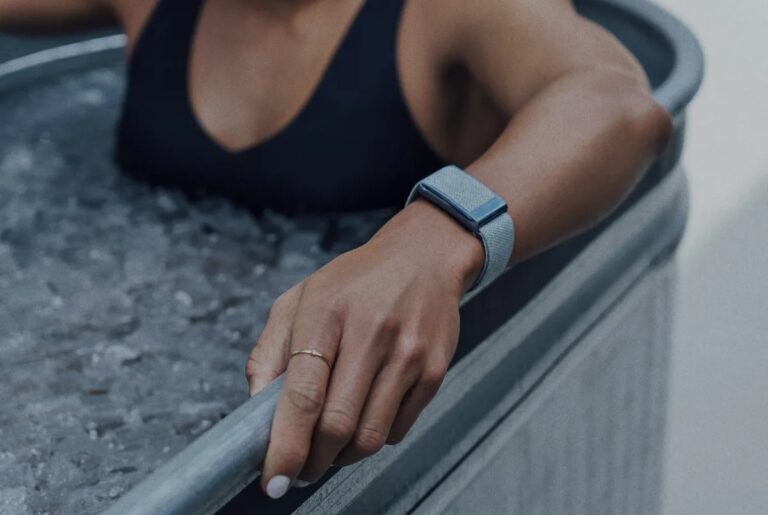 Person wearing WHOOP band in an ice bath