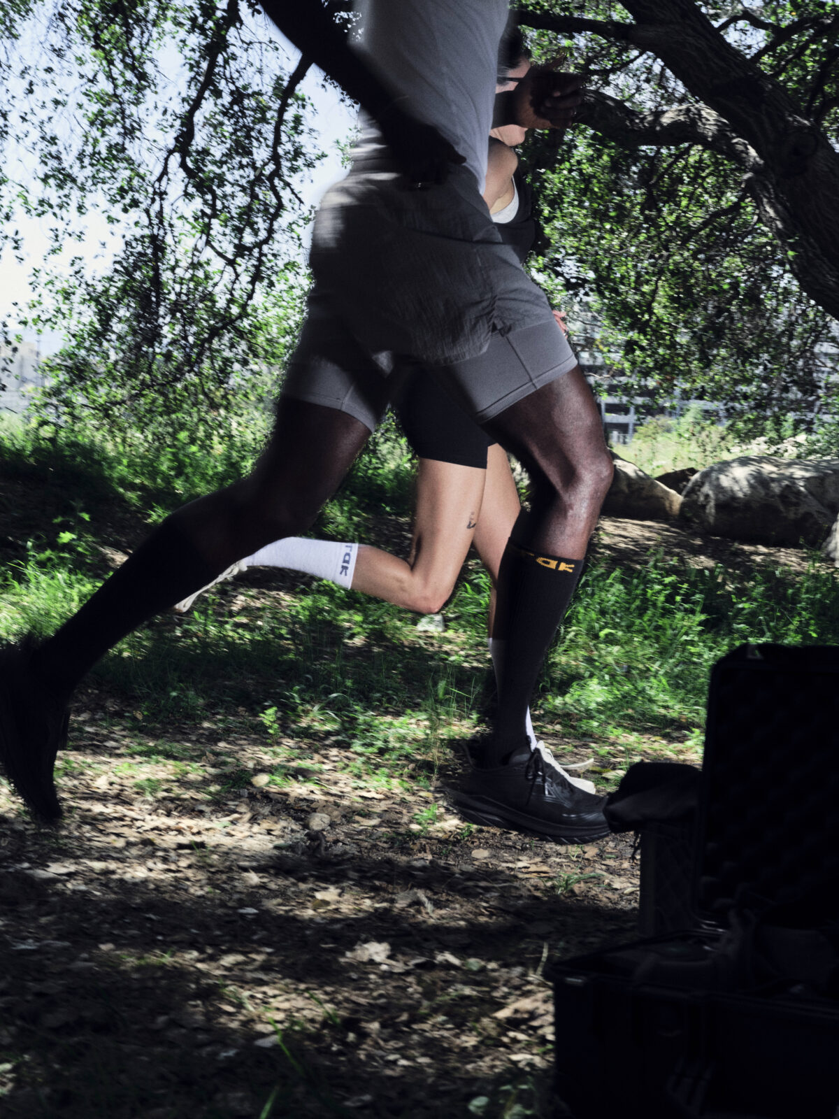 Runners wearing TRAK Compression