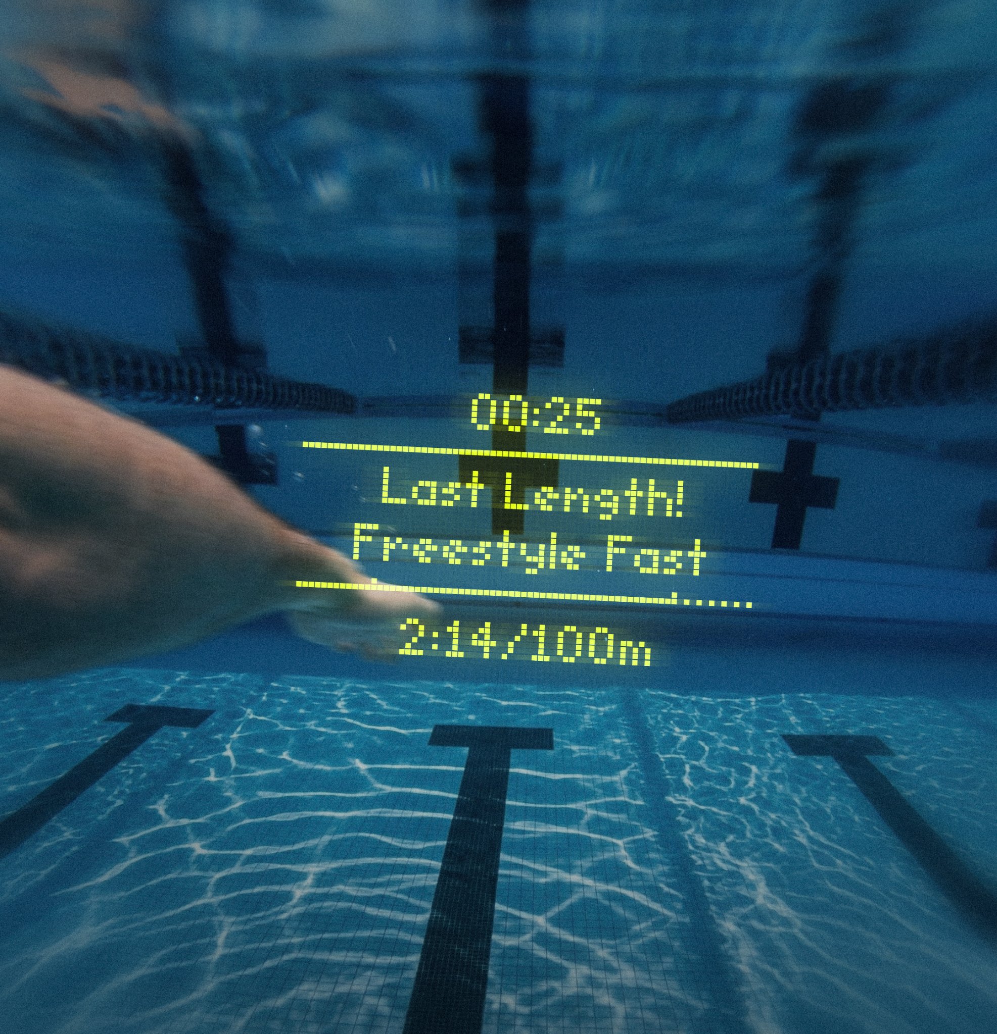Underwater in a swimming pool with metrics overlayed
