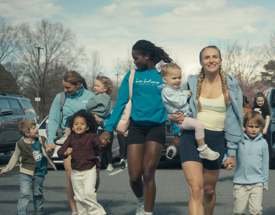 Mothers and children walking to Burn Boot Camp