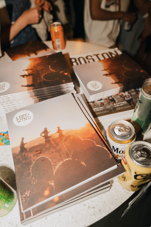 Like the Wind Magazine stacked on a table