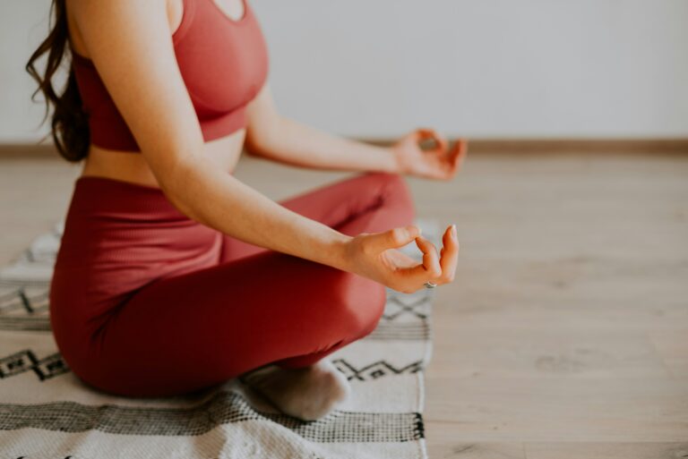 woman in red yoga outfit
