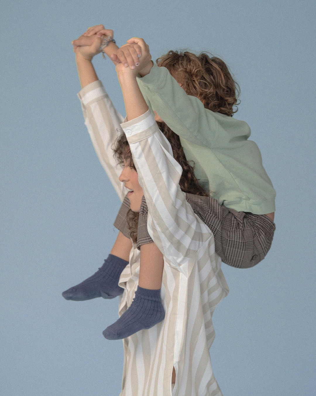 Woman with a child on her shoulders