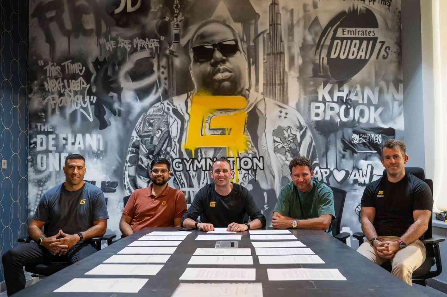 Investment signing team at GymNation