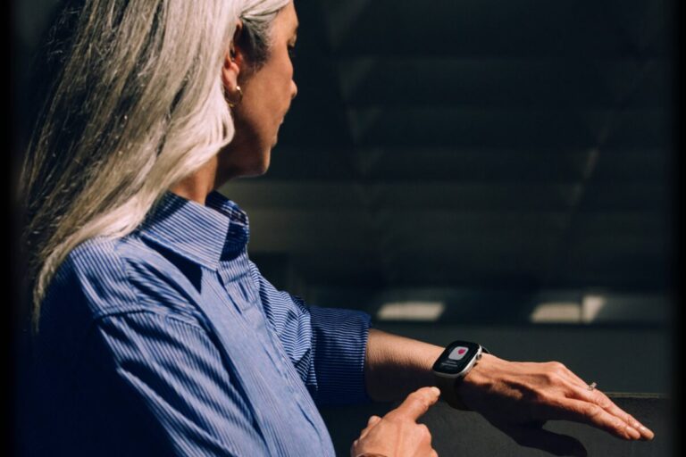 Midlife woman wearing an Apple Watch