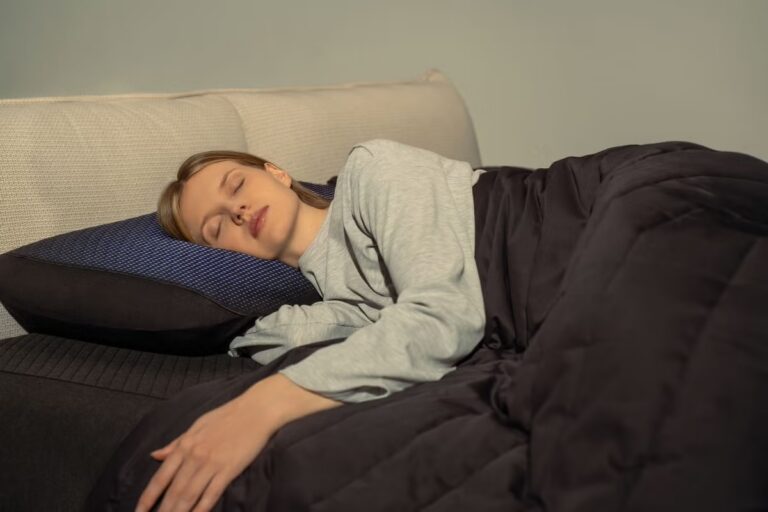 Woman sleeping with Eight Sleep's pillow cover