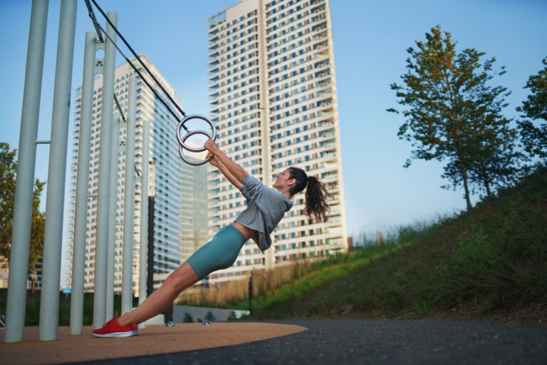 Woman exercising at an outdoor gym