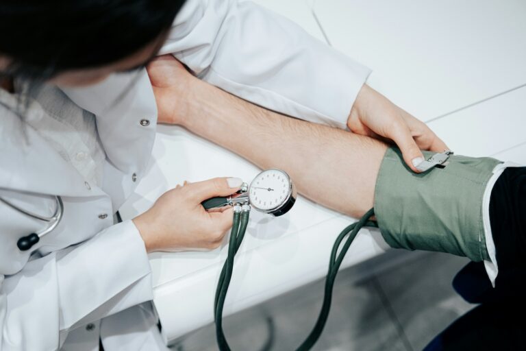 nurse taking blood pressure