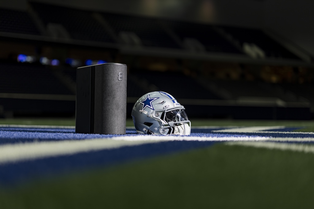 Dallas Cowboys football helmet next to Eight Sleep Pod