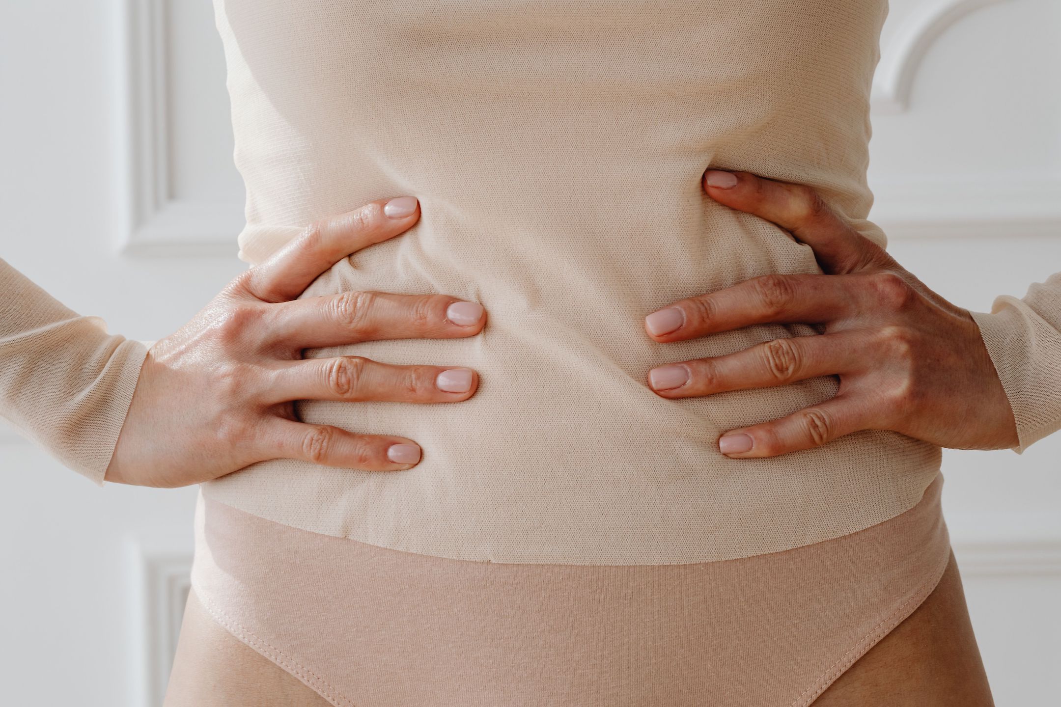 Woman holding her hips