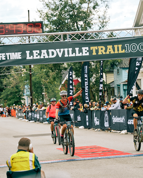 Cyclist crossing the finish line of Leadville Race