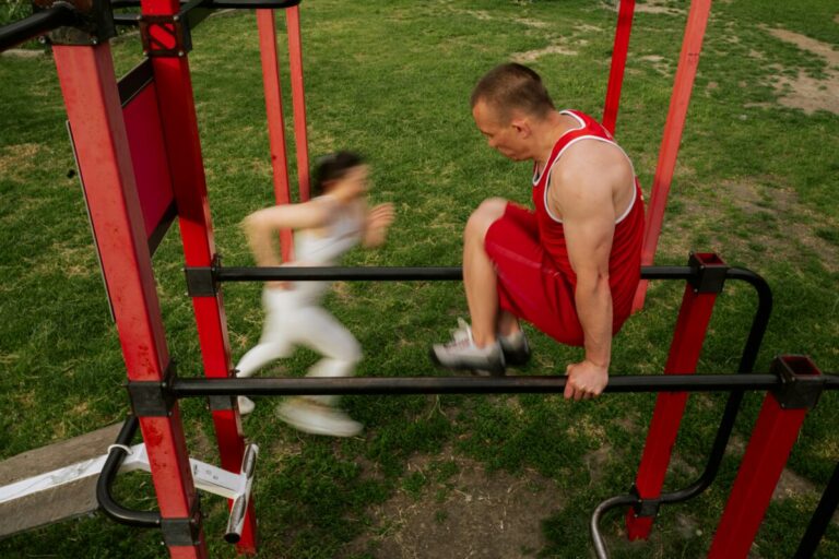 Two young adults working out as a playground
