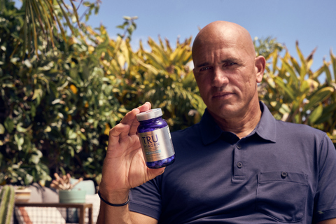 Kelly Slater with Niagen Bioscience product