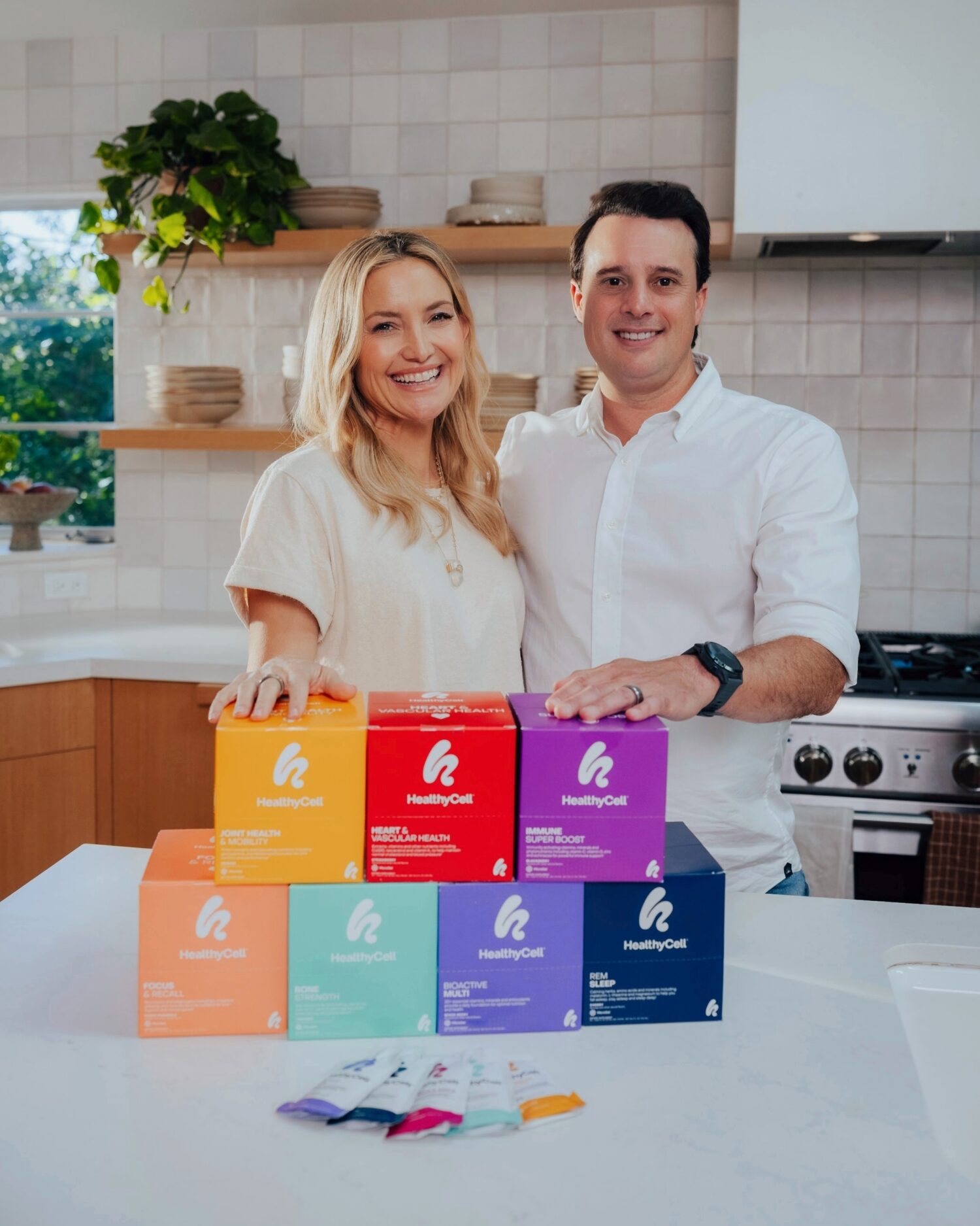 Kate Hudson posing with HealthyCell products