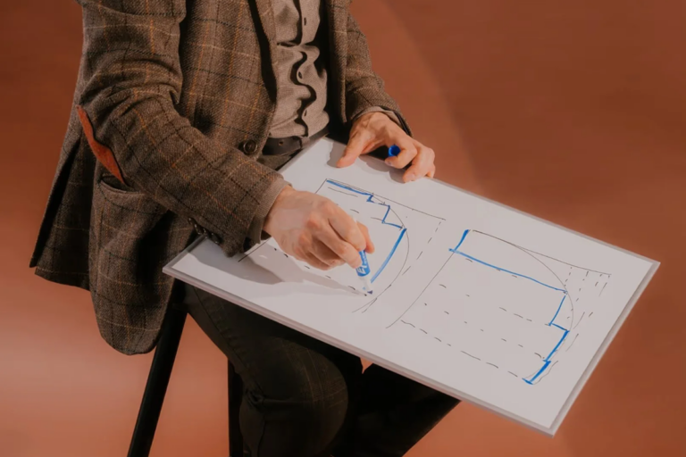 Man drawing a graph representing deprescribing