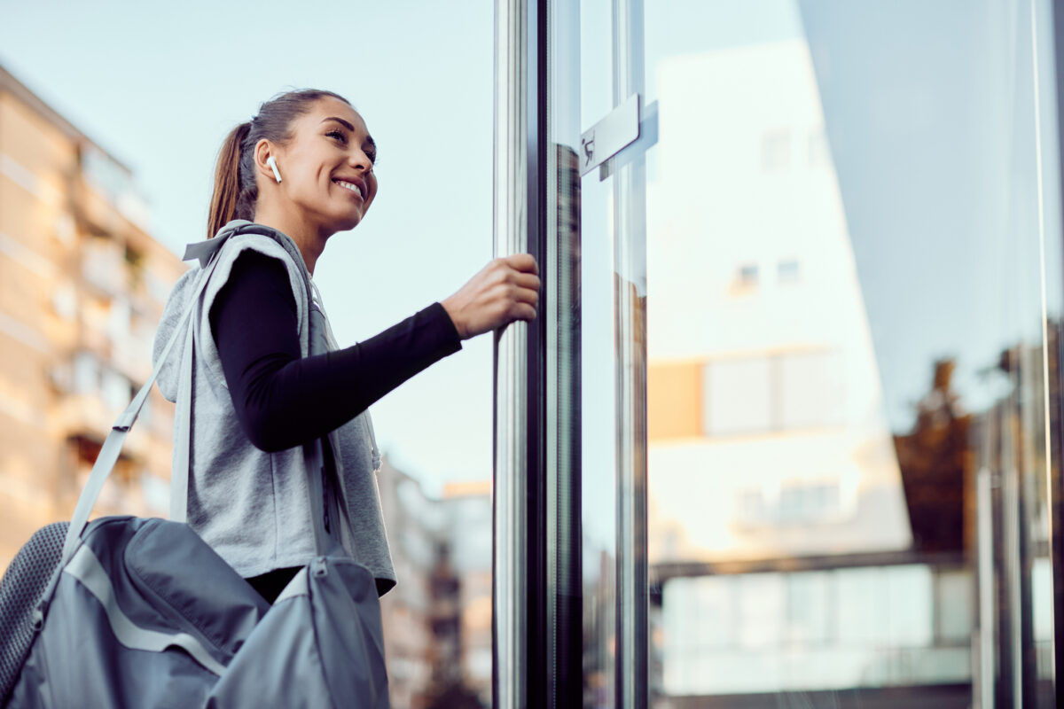Woman entering a gym